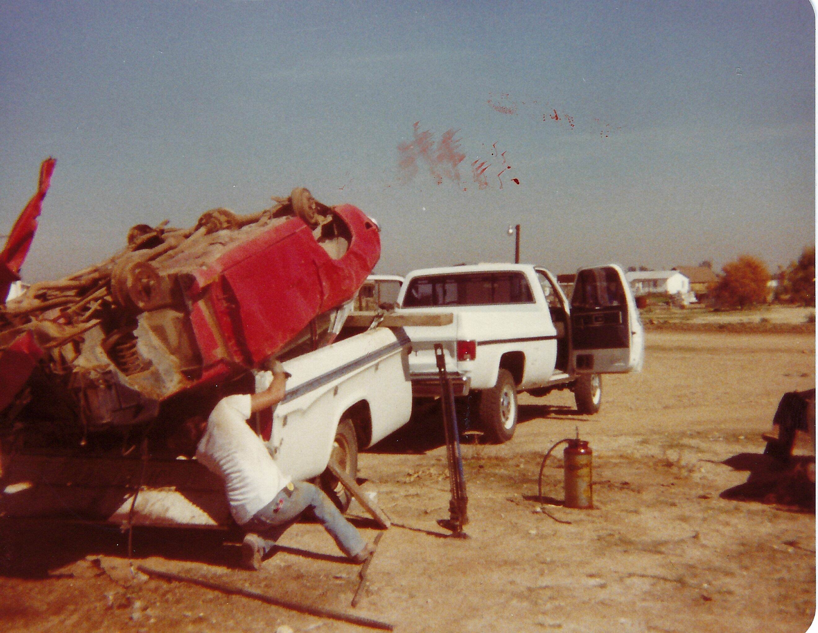 Dad with the Dodge and work trailer